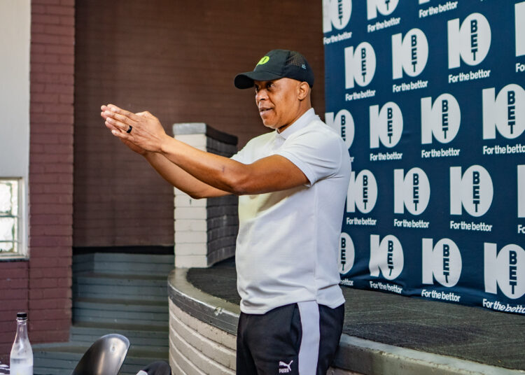Doc Khumalo explaining something to the coaches at the Gear up Ikasi meeting
