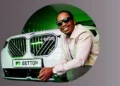 Andile Ncube standing next to the bmw x3