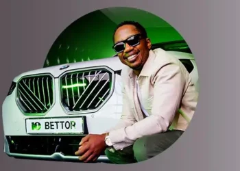 Andile Ncube standing next to the bmw x3